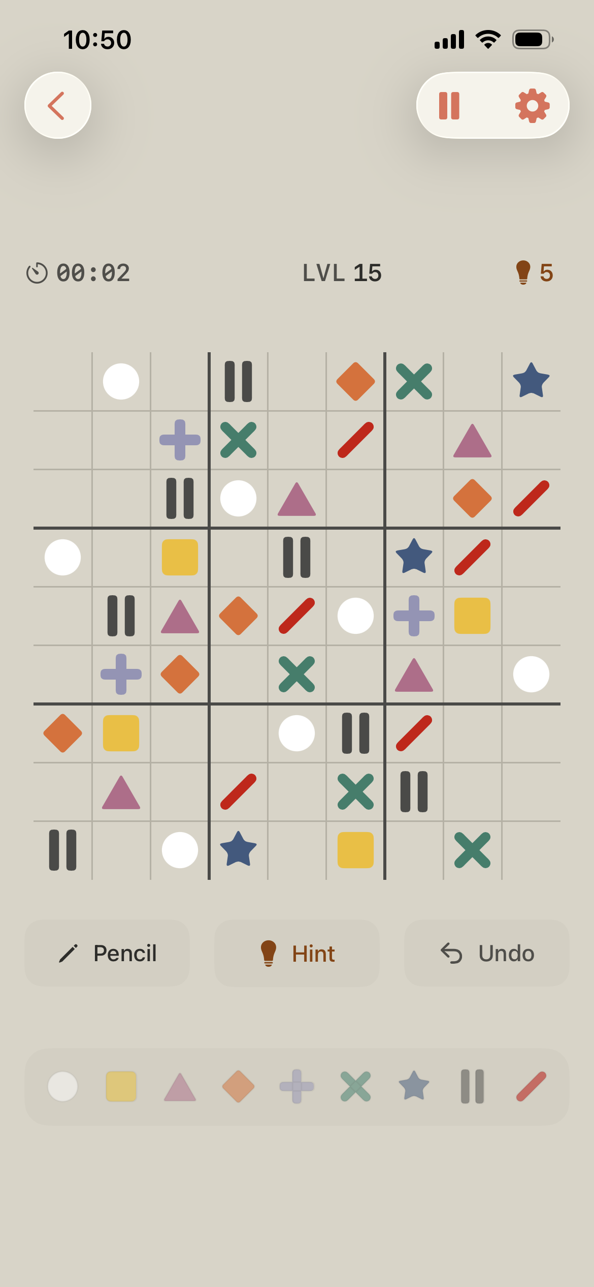 A real Hue9 game board using nine colors paired with nine distinct symbols.